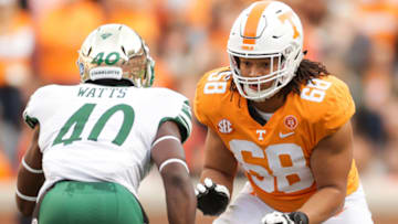 KNOXVILLE, TN - NOVEMBER 3: Offensive lineman Marcus Tatum #68 of the Tennessee Volunteers blocks Markees Watts #40 of the Charlotte 49ers during the game between the Charlotte 49ers and the Tennessee Volunteers at Neyland Stadium on November 3, 2018 in Knoxville, Tennessee. Tennessee won the game 14-3. (Photo by Donald Page/Getty Images)