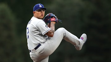 DENVER, COLORADO - JULY 30: Starting pitcher Julio Urias #7 of the Los Angeles Dodgers throws in the first inning against the Colorado Rockies at Coors Field on July 30, 2019 in Denver, Colorado. (Photo by Matthew Stockman/Getty Images)