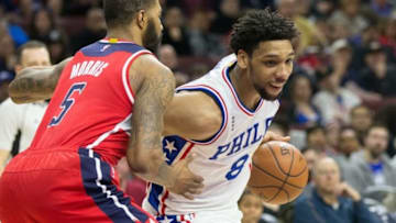 Feb 26, 2016; Philadelphia, PA, USA; Philadelphia 76ers center Jahlil Okafor (8) drives against Washington Wizards forward Markieff Morris (5) during the second half at Wells Fargo Center. The Washington Wizards won 103-94. Mandatory Credit: Bill Streicher-USA TODAY Sports