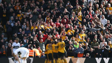 WOLVERHAMPTON, ENGLAND - MAY 04: Leander Dendoncker of Wolverhampton Wanderers celebrates with teammates after scoring his team's first goal during the Premier League match between Wolverhampton Wanderers and Fulham FC at Molineux on May 04, 2019 in Wolverhampton, United Kingdom. (Photo by Jan Kruger/Getty Images)