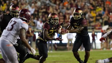 TALLAHASSEE, FL - SEPTEMBER 03: Florida State Seminoles running back Cam Akers (3) hands the ball off to Florida State Seminoles running back Amir Rasul (22) during the game between the Florida State Seminoles and the Virginia Tech Hokies September 03, 2018, at Doak Campbell Stadium in Tallahassee, Florida.(Photo by Logan Stanford/Icon Sportswire via Getty Images)