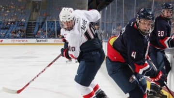BUFFALO, NY - SEPTEMBER 24: Charlie McAvoy #4 of Team Plante battles for the puck against Graham McPhee #10 of Team Roenick during the CCM/USA Hockey All-American Prospects Game on September 24, 2015 at First Niagara Center in Buffalo, New York. (Photo by Jen Fuller/Getty Images)