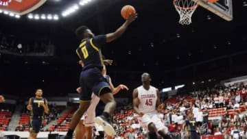 Feb 21, 2016; Pullman, WA, USA; California Golden Bears forward Jaylen Brown (0) goes up for a shot against Washington State Cougars center Valentine Izundu (45) during the second half at Wallis Beasley Performing Arts Coliseum. The Golden Bears won 80-62. Mandatory Credit: James Snook-USA TODAY Sports