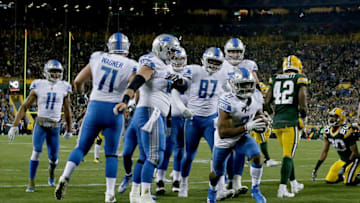 GREEN BAY, WI - NOVEMBER 06: Ameer Abdullah #21 of the Detroit Lions celebrates with teammates after scoring a touchdown in the second quarter against the Green Bay Packers at Lambeau Field on November 6, 2017 in Green Bay, Wisconsin. (Photo by Dylan Buell/Getty Images)