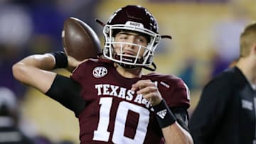 Auburn footballBATON ROUGE, LOUISIANA - NOVEMBER 27: Zach Calzada #10 of the Texas A&M Aggies warms up before a game against the LSU Tigers at Tiger Stadium on November 27, 2021 in Baton Rouge, Louisiana. (Photo by Jonathan Bachman/Getty Images)