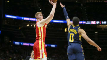 Mar 13, 2022; Atlanta, Georgia, USA; Atlanta Hawks guard Kevin Huerter (3) shoots over Indiana Pacers guard Tyrese Haliburton (0) in the second half at State Farm Arena. Mandatory Credit: Brett Davis-USA TODAY Sports