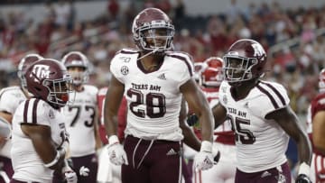 Sep 28, 2019; Arlington, TX, USA; Texas A&M Aggies running back Isaiah Spiller (28) celebrates scoring a touchdown in the second quarter against the Arkansas Razorbacks at AT&T Stadium. Mandatory Credit: Tim Heitman-USA TODAY Sports