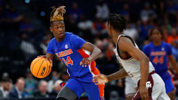 Mar 10, 2022; Tampa, FL, USA; Florida Gators guard Kowacie Reeves (14) drives to the basket against the Texas A&M Aggies during the second half at Amalie Arena. Mandatory Credit: Kim Klement-USA TODAY Sports
