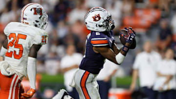 Auburn football Sep 3, 2022; Auburn, Alabama, USA; Auburn Tigers wide receiver Ja'Varrius Johnson (6) gets past Mercer Bears cornerback TJ Moore (25) and makes a catch during the third quarter against at Jordan-Hare Stadium. Mandatory Credit: John Reed-USA TODAY Sports