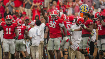 Sep 16, 2023; Athens, Georgia, USA; Georgia Bulldogs defensive lineman Zion Logue (96) reacts after Georgia intercepted a pass against South Carolina Gamecocks during the second half at Sanford Stadium. Mandatory Credit: Dale Zanine-USA TODAY Sports