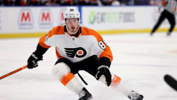 Apr 16, 2022; Buffalo, New York, USA; Philadelphia Flyers left wing Joel Farabee (86) looks for the puck during the first period against the Buffalo Sabres at KeyBank Center. Mandatory Credit: Timothy T. Ludwig-USA TODAY Sports
