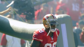 SAN FRANCISCO, CA - OCTOBER 09: Parys Haralson #98 of the San Francisco 49ers runs onto the field during player introduction before an NFL football game against the Tampa Bay Buccaneers at Candlestick Park on October 9, 2011 in San Francisco, California. The 49ers won the game 48-3. (Photo by Thearon W. Henderson/Getty Images)
