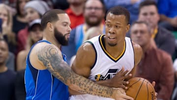 Dec 16, 2016; Salt Lake City, UT, USA; Dallas Mavericks guard Deron Williams (8) defends against Utah Jazz guard Rodney Hood (5) during the first quarter at Vivint Smart Home Arena. Mandatory Credit: Russ Isabella-USA TODAY Sports