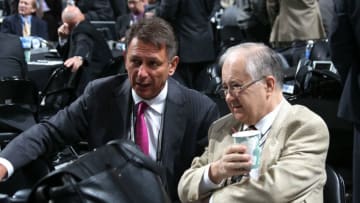 PITTSBURGH, PA - JUNE 23: Detroit Red Wings General Manager Ken Holland (L) and Detroit Red Wings Senior Vice President Jim Devellano speak during day two of the 2012 NHL Entry Draft at Consol Energy Center on June 23, 2012 in Pittsburgh, Pennsylvania. (Photo by Bruce Bennett/Getty Images)