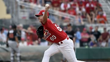 Mar 20, 2016; Jupiter, FL, USA; St. Louis Cardinals relief pitcher Dean Kiekhefer (60) delivers a pitch against the Miami Marlins during the game at Roger Dean Stadium. The Marlins defeated the Cardinals 5-2. Mandatory Credit: Scott Rovak-USA TODAY Sports