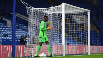 LONDON, ENGLAND - DECEMBER 05: Edouard Mendy of Chelsea in action during the Premier League match between Chelsea and Leeds United at Stamford Bridge on December 05, 2020 in London, England. A limited number of fans are welcomed back to stadiums to watch elite football across England. This was following easing of restrictions on spectators in tiers one and two areas only. (Photo by Mike Hewitt/Getty Images)