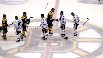 BOSTON, MA - JUNE 24: Duncan Keith #2 of the Chicago Blackhawks shakes hands with Zdeno Chara #33 of the Boston Bruins after Game Six of the 2013 NHL Stanley Cup Final at TD Garden on June 24, 2013 in Boston, Massachusetts. (Photo by Elsa/Getty Images)