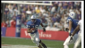 1 Jan 1997: Ronny Jenkins of the Brigham Young Cougars moves down the field during the Cotton Bowl against the Kansas State Wildcats at the Cotton Bowl in Dallas, Texas. BYU won the game, 19-15. Mandatory Credit: Matthew Stockman /Allsport