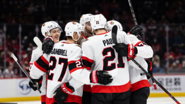 WASHINGTON, DC - JANUARY 22: Thomas Chabot #72 of the Ottawa Senators celebrates with teammates after scoring a goal against the Washington Capitals during the first period of the game at Capital One Arena on January 22, 2022 in Washington, DC. (Photo by Scott Taetsch/Getty Images)