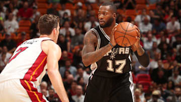 MIAMI, FL - OCTOBER 30: Jonathon Simmons #17 of the San Antonio Spurs handles the ball during a game against the Miami Heat on October 30, 2016 at American Airlines Arena in Miami, Florida. NOTE TO USER: User expressly acknowledges and agrees that, by downloading and or using this photograph, user is consenting to the terms and conditions of the Getty Images License Agreement. Mandatory Copyright Notice: Copyright 2016 NBAE (Photo by Issac Baldizon/NBAE via Getty Images)