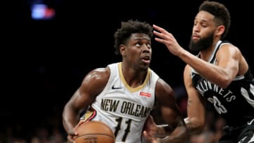 NEW YORK, NY - FEBRUARY 10: Jrue Holiday #11 of the New Orleans Pelicans works against Allen Crabbe #33 of the Brooklyn Nets in the first round of overtime during their game at Barclays Center on February 10, 2018 in the Brooklyn borough of New York City. (Photo by Abbie Parr/Getty Images)