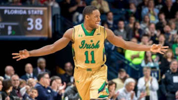 Dec 13, 2014; South Bend, IN, USA; Notre Dame Fighting Irish guard Demetrius Jackson (11) celebrates after making a three point basket in the second half against the Florida State Seminoles at the Purcell Pavilion. Mandatory Credit: Matt Cashore-USA TODAY Sports