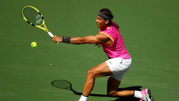 INDIAN WELLS, CALIFORNIA - MARCH 12: Rafael Nadal of Spain plays a backhand against Diego Schwartzman of Argentina during their men's singles third round match on day nine of the BNP Paribas Open at the Indian Wells Tennis Garden on March 12, 2019 in Indian Wells, California. (Photo by Clive Brunskill/Getty Images)