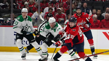 Mar 20, 2022; Washington, District of Columbia, USA; Washington Capitals centerman Evgeny Kuznetsov (92) attempts an unsuccessful shot against the Dallas Stars at Capital One Arena. Mandatory Credit: Mitch Stringer-USA TODAY Sports