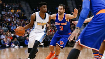 Mar 8, 2016; Denver, CO, USA; Denver Nuggets guard Emmanuel Mudiay (0) dribbles the ball against New York Knicks guard Jose Calderon (3) in the second quarter at the Pepsi Center. Mandatory Credit: Isaiah J. Downing-USA TODAY Sports