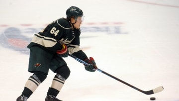 Apr 24, 2016; Saint Paul, MN, USA; Minnesota Wild center Mikael Granlund (64) carries the puck across mid-ice during the third period Minnesota Wild Dallas Stars in game six of the first round of the 2016 Stanley Cup Playoffs at Xcel Energy Center. The Stars win 5-4 over the Wild. Mandatory Credit: Marilyn Indahl-USA TODAY Sports