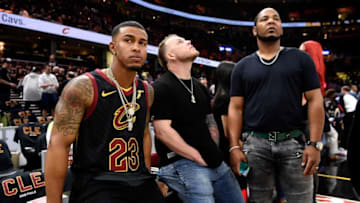CLEVELAND, OH - JUNE 06: (Left to right) Francisco Lindor, Roberto Perez and Edwin Encarnacion of the Cleveland Indians look on from the sideline during warm ups prior to Game Three of the 2018 NBA Finals between the Golden State Warriors and the Cleveland Cavaliers at Quicken Loans Arena on June 6, 2018 in Cleveland, Ohio. NOTE TO USER: User expressly acknowledges and agrees that, by downloading and or using this photograph, User is consenting to the terms and conditions of the Getty Images License Agreement. (Photo by Jason Miller/Getty Images)