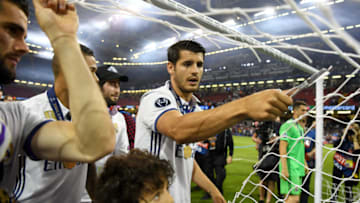 CARDIFF, WALES - JUNE 03: Alvaro Morata of Real Madrid cuts the net after the UEFA Champions League Final between Juventus and Real Madrid at National Stadium of Wales on June 3, 2017 in Cardiff, Wales. (Photo by Shaun Botterill/Getty Images)