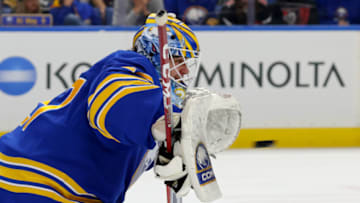 Oct 12, 2023; Buffalo, New York, USA; Buffalo Sabres goaltender Devon Levi (27) makes a blocker save during the second period against the New York Rangers at KeyBank Center. Mandatory Credit: Timothy T. Ludwig-USA TODAY Sports