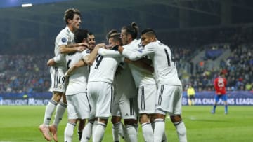PLZEN, CZECH REPUBLIC - NOVEMBER 07: Karim Benzema (C) of Real Madrid celebrates with team mates after scoring their team's third goal during the Group G match of the UEFA Champions League between Viktoria Plzen and Real Madrid at Doosan Arena on November 7, 2018 in Plzen, Czech Republic. (Photo by Angel Martinez/Real Madrid via Getty Images)
