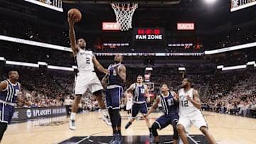 Apr 30, 2016; San Antonio, TX, USA; San Antonio Spurs small forward Kawhi Leonard (2) shoots the ball as Oklahoma City Thunder power forward Serge Ibaka (9) defends in game one of the second round of the NBA Playoffs at AT&T Center. Mandatory Credit: Soobum Im-USA TODAY Sports
