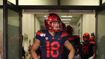 TUCSON, ARIZONA - SEPTEMBER 07: Wide receiver Cedric Peterson #18 of the Arizona Wildcats walks out onto the field before the NCAAF game against the Northern Arizona Lumberjacks at Arizona Stadium on September 07, 2019 in Tucson, Arizona. (Photo by Christian Petersen/Getty Images)