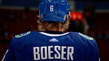 VANCOUVER, BC - DECEMBER 20: Brock Boeser #6 of the Vancouver Canucks looks on from the bench during their NHL game against the St. Louis Blues at Rogers Arena December 20, 2018 in Vancouver, British Columbia, Canada. (Photo by Jeff Vinnick/NHLI via Getty Images)"n