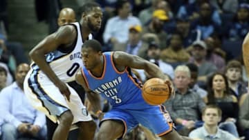 Dec 8, 2015; Memphis, TN, USA; Oklahoma City Thunder guard Dion Waiters (3) drives against Memphis Grizzlies forward JaMychal Green (0) in the first half at FedExForum. Mandatory Credit: Nelson Chenault-USA TODAY Sports