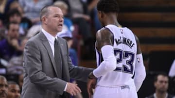 November 30, 2014; Sacramento, CA, USA; Sacramento Kings head coach Michael Malone (left) talks to guard Ben McLemore (23) during the fourth quarter against the Memphis Grizzlies at Sleep Train Arena. The Grizzlies defeated the Kings 97-85. Mandatory Credit: Kyle Terada-USA TODAY Sports