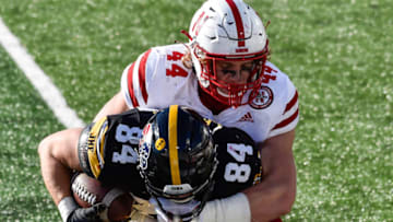 Nov 27, 2020; Iowa City, Iowa, USA; Iowa Hawkeyes tight end Sam LaPorta (84) and Nebraska Cornhuskers linebacker Garrett Nelson (44) in action at Kinnick Stadium. Mandatory Credit: Jeffrey Becker-USA TODAY Sports