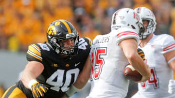 IOWA CITY, IOWA- SEPTEMBER 01: Defensive end Parker Hesse #40 of the Iowa Hawkeyes gets a sack during the second half on quarterback Marcus Childers #15 of the Northern Illinois Huskies on September 1, 2018 at Kinnick Stadium, in Iowa City, Iowa. (Photo by Matthew Holst/Getty Images)