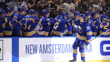 Mar 10, 2022; Buffalo, New York, USA; Buffalo Sabres center Peyton Krebs (19) celebrates his goal with teammates during the first period against the Vegas Golden Knights at KeyBank Center. Mandatory Credit: Timothy T. Ludwig-USA TODAY Sports
