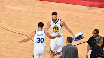 HOUSTON, TX - MARCH 13: Stephen Curry #30 and Klay Thompson #11 of the Golden State Warriors high-five after a game against the Houston Rockets on March 13, 2019 at the Toyota Center in Houston, Texas. NOTE TO USER: User expressly acknowledges and agrees that, by downloading and or using this photograph, User is consenting to the terms and conditions of the Getty Images License Agreement. Mandatory Copyright Notice: Copyright 2019 NBAE (Photo by Jesse D. Garrabrant/NBAE via Getty Images)