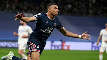Paris Saint-Germain's French forward Kylian Mbappe celebrates scoring his team's first goal during the UEFA Champions League round of 16 second league football match between Real Madrid CF and Paris Saint-Germain at the Santiago Bernabeu stadium in Madrid on March 9, 2022. (Photo by GABRIEL BOUYS / AFP) (Photo by GABRIEL BOUYS/AFP via Getty Images)