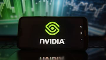 POLAND - 2022/01/05: In this photo illustration a NVidia logo is displayed on a smartphone with stock market percentages in the background. (Photo Illustration by Omar Marques/SOPA Images/LightRocket via Getty Images)