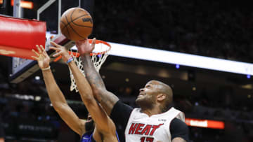 Miami Heat forward P.J. Tucker (17) grand a rebound over Dallas Mavericks guard Spencer Dinwiddie (26)(Sam Navarro-USA TODAY Sports)