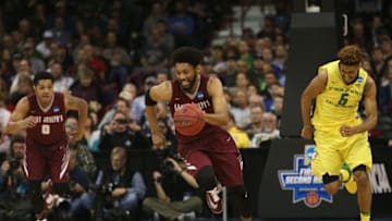 SPOKANE, WA - MARCH 20: DeAndre Bembry #43 of the Saint Joseph's Hawks drives up court against Tyler Dorsey #5 of the Oregon Ducks in the first half during the second round of the 2016 NCAA Men's Basketball Tournament at Spokane Veterans Memorial Arena on March 20, 2016 in Spokane, Washington. (Photo by Patrick Smith/Getty Images)