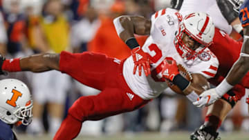 CHAMPAIGN, IL - SEPTEMBER 21: Maurice Washington #28 of the Nebraska Cornhuskers stretches for yardage at the end of a run during the first half against the Illinois Fighting Illini at Memorial Stadium on September 21, 2019 in Champaign, Illinois. (Photo by Michael Hickey/Getty Images)