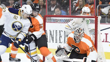 Feb 11, 2016; Philadelphia, PA, USA; Buffalo Sabres left wing Marcus Foligno (82) battles for rebound against Philadelphia Flyers defenseman Shayne Gostisbehere (53) and goalie Steve Mason (35) during the first period at Wells Fargo Center. Mandatory Credit: Eric Hartline-USA TODAY Sports
