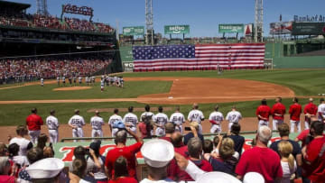 Jul 4, 2016; Boston, MA, USA; Sailors salute the flag during the National Anthem before the game between the Boston Red Sox and the Texas Rangers at Fenway Park. Mandatory Credit: Winslow Townson-USA TODAY Sports